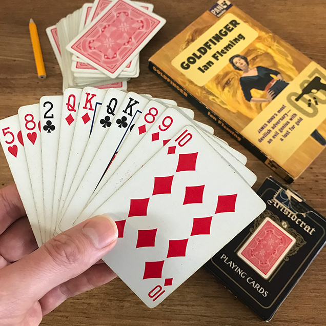 A vintage deck of Aristocrat 727 Banknote cards with the same color box and back of cards.